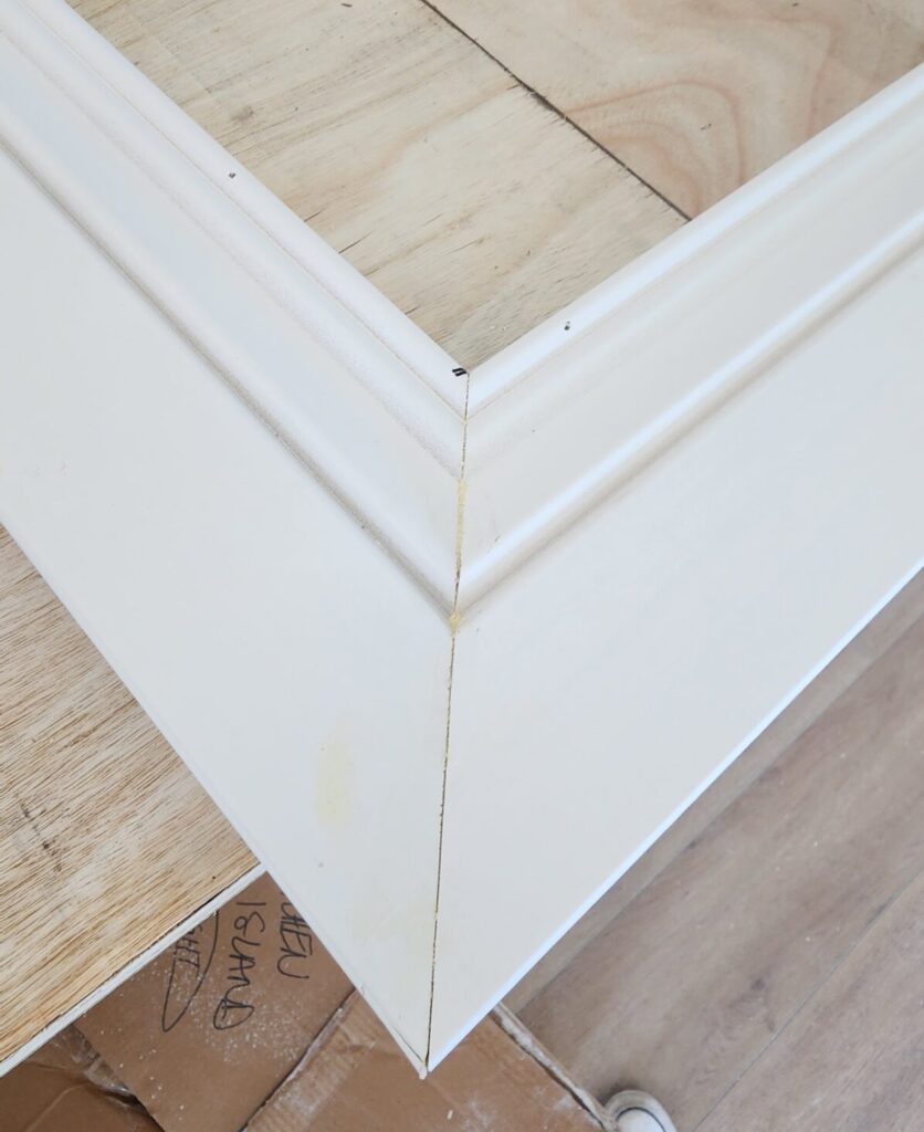 Close-up of mitered trim corner showing precise finish carpentry detail in Springfield Missouri